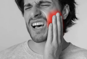 man with tooth pain